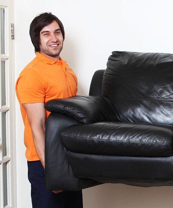 Fantastic Removals pro holding a sofa