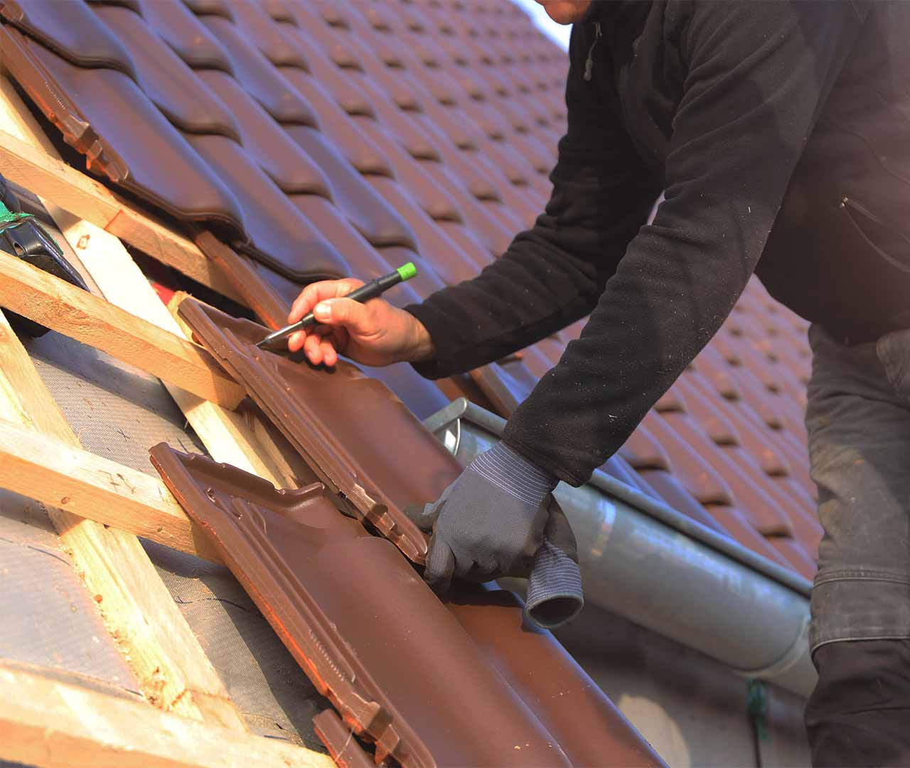 Roof plumber working