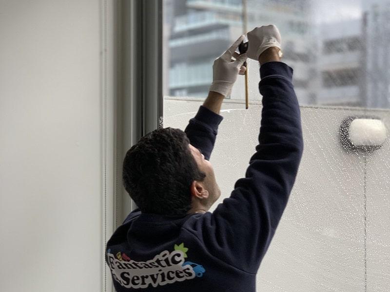 Window cleaner working